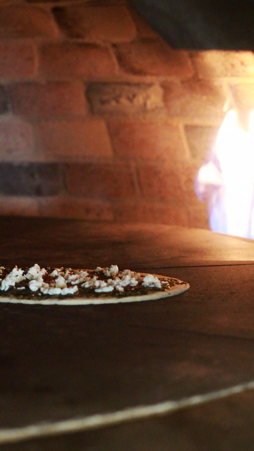 Za’atar flatbread in the stone oven at Simsim